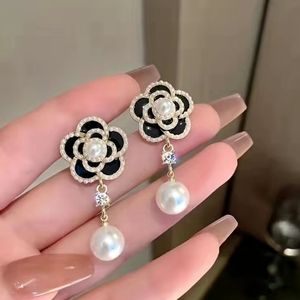Nwtib.Classy Camellia flower faux pearl beautiful earrings